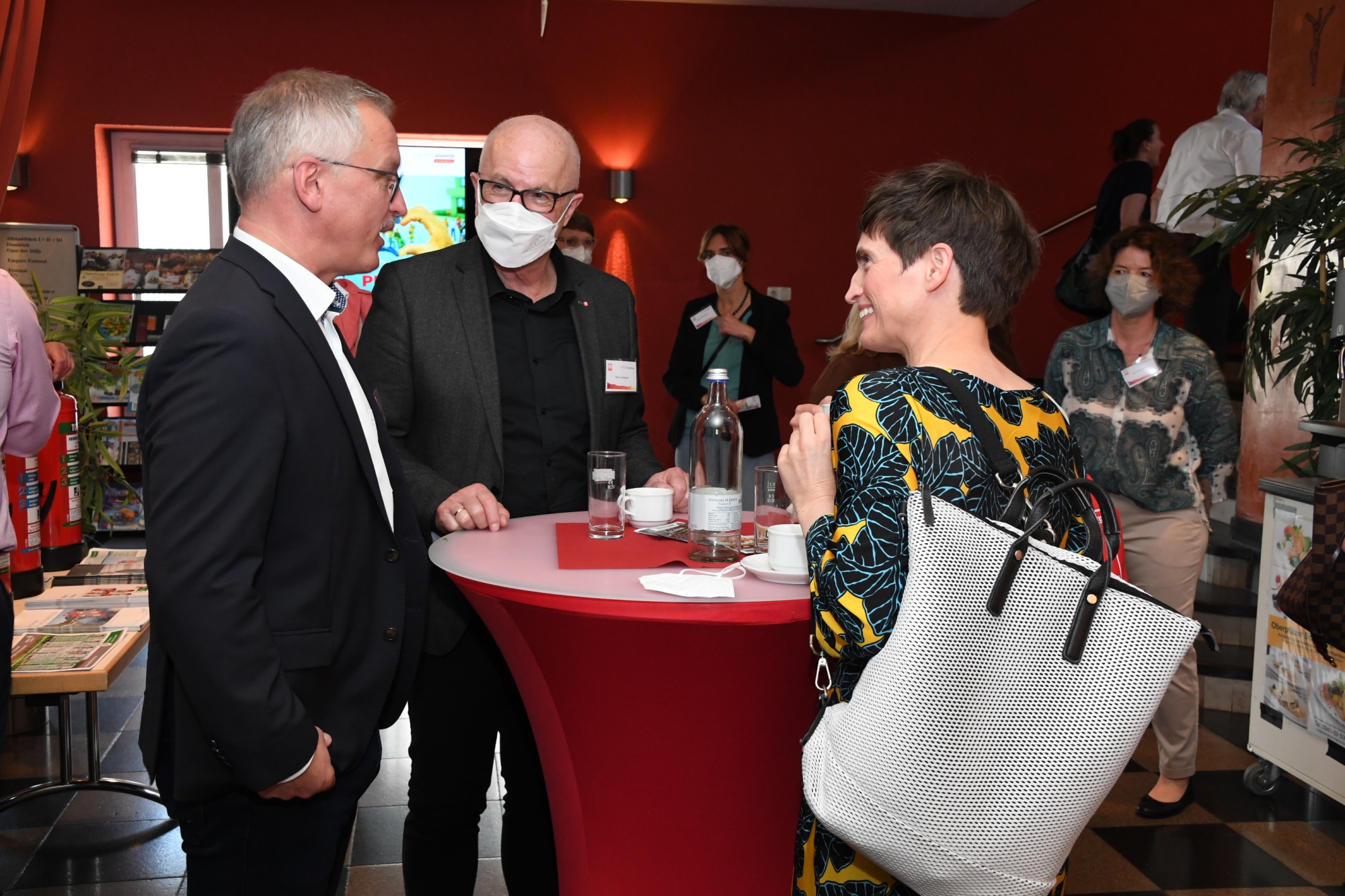 Personen auf einem Kongress