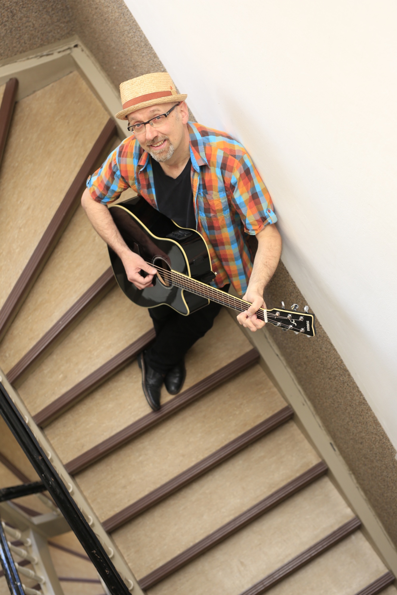 Mann mit Gitarre