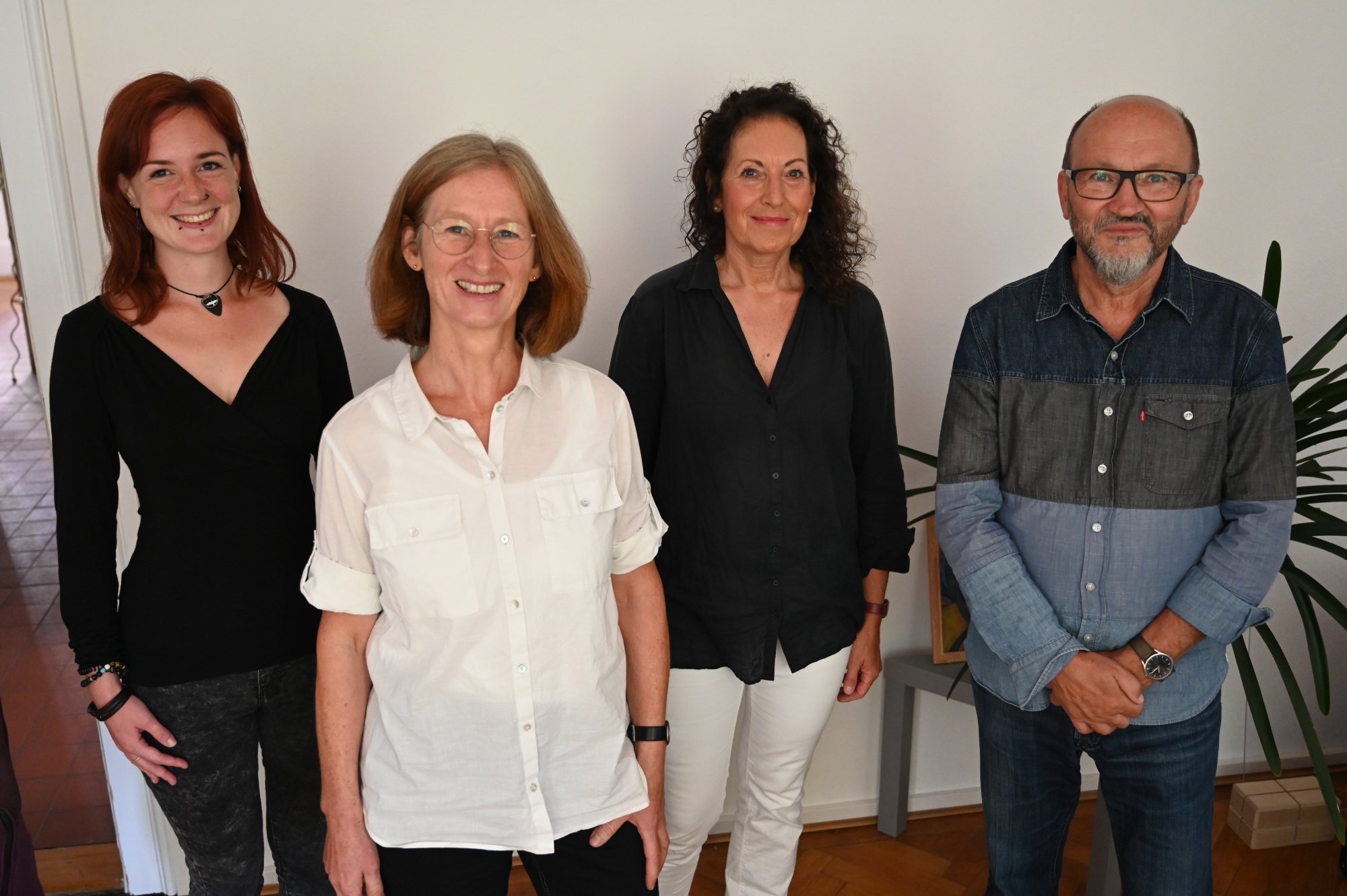 Vier Personen im Portrait